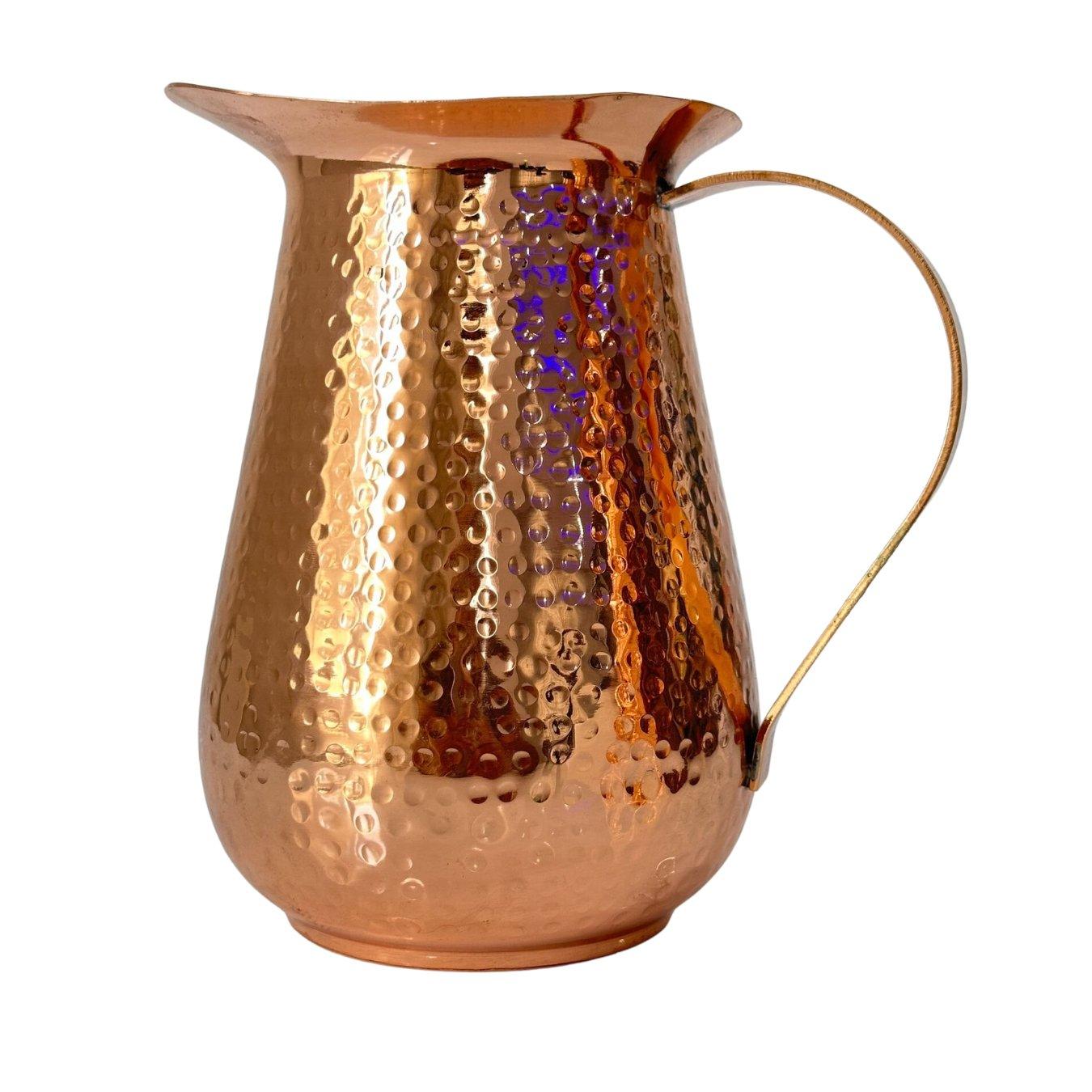 copper pitcher pounded design 